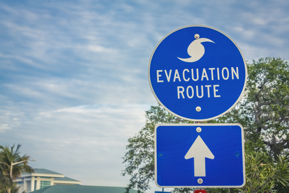 A street sign shows the hurricane evacuation route