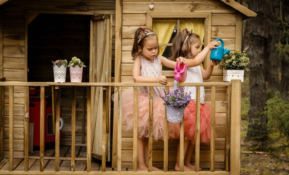 Kids inside custom treehouse